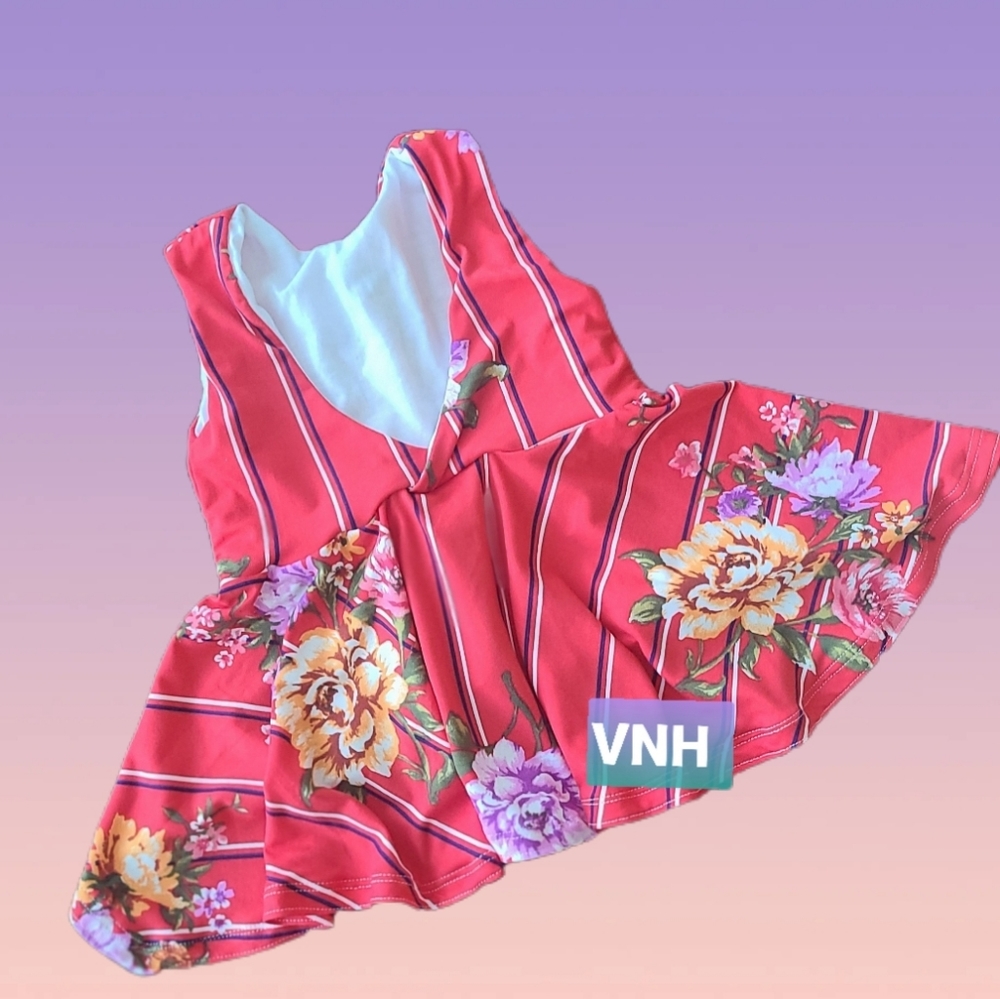 Hi low sleeveless peplum